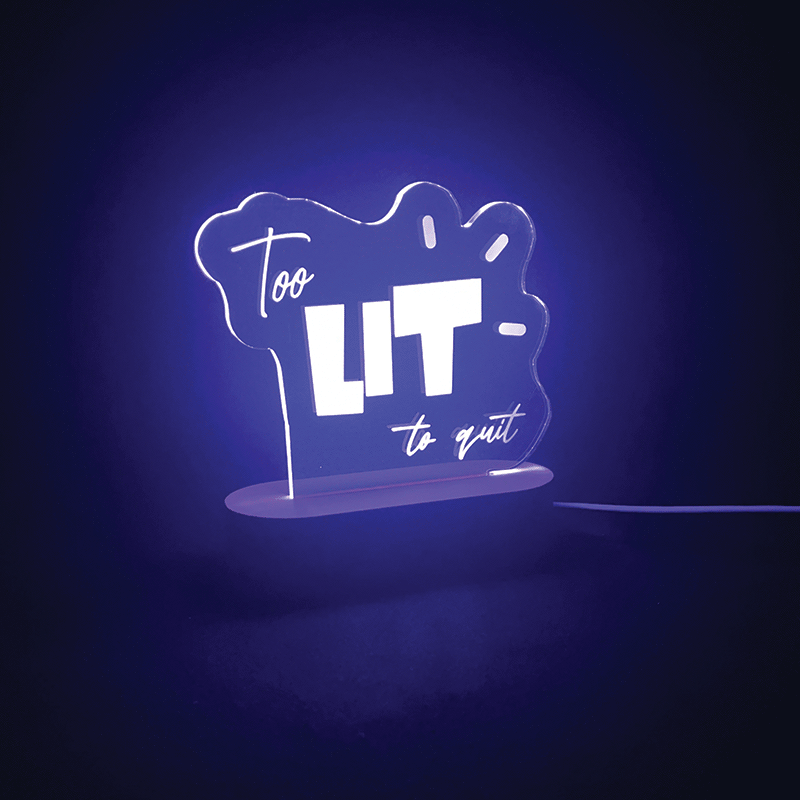 Too Lit To Quit LED sign glowing